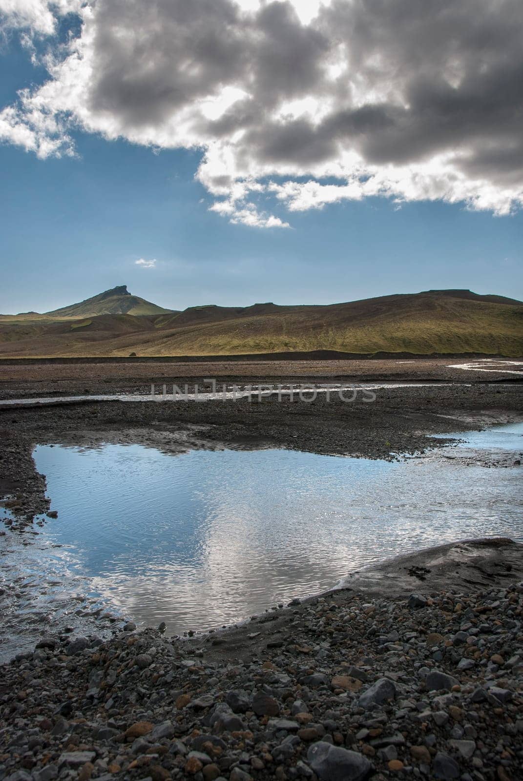 river among stones and mountains in Iceland