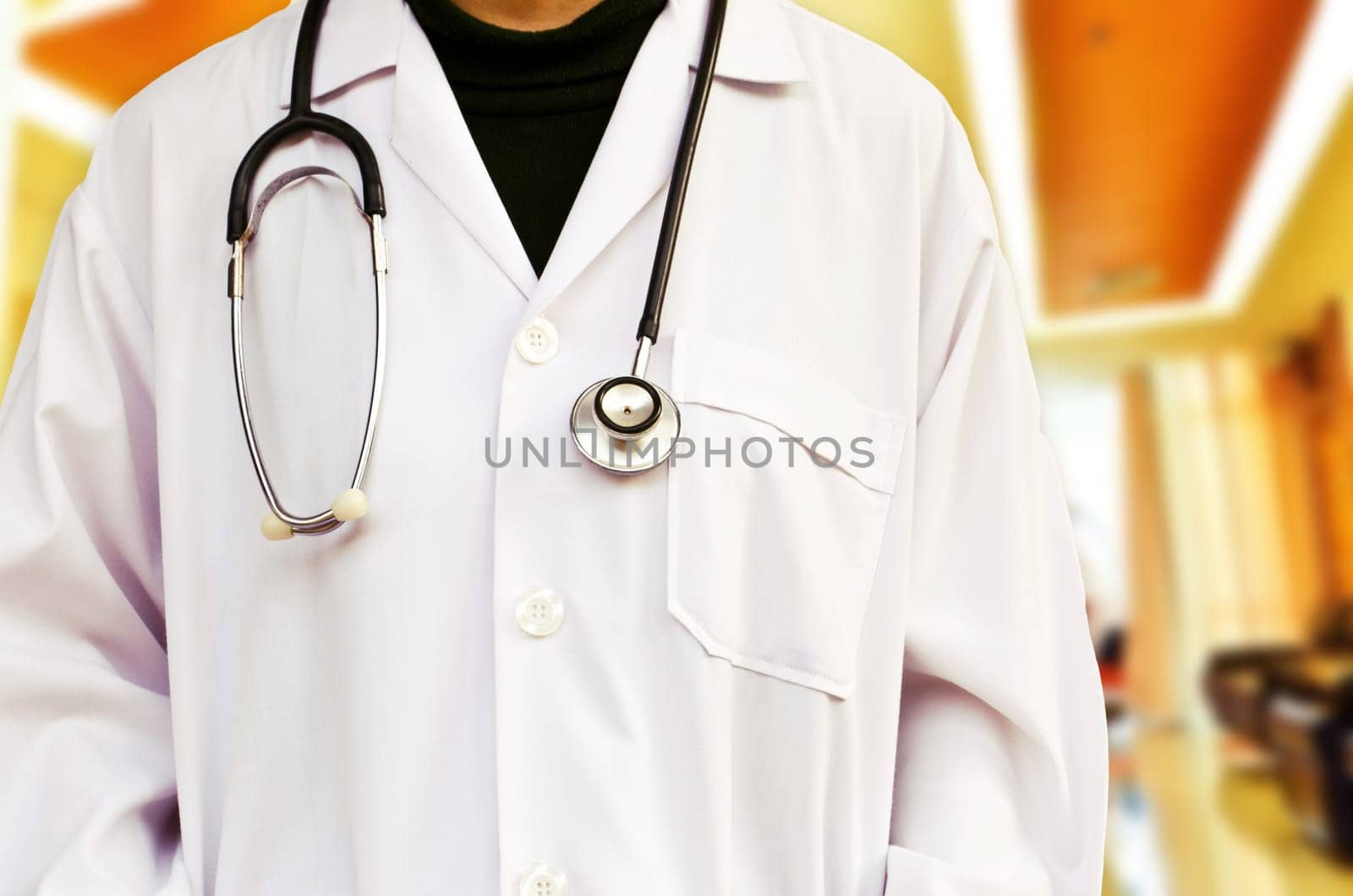 Doctor with a stethoscope in hospital. (Medical Concept)