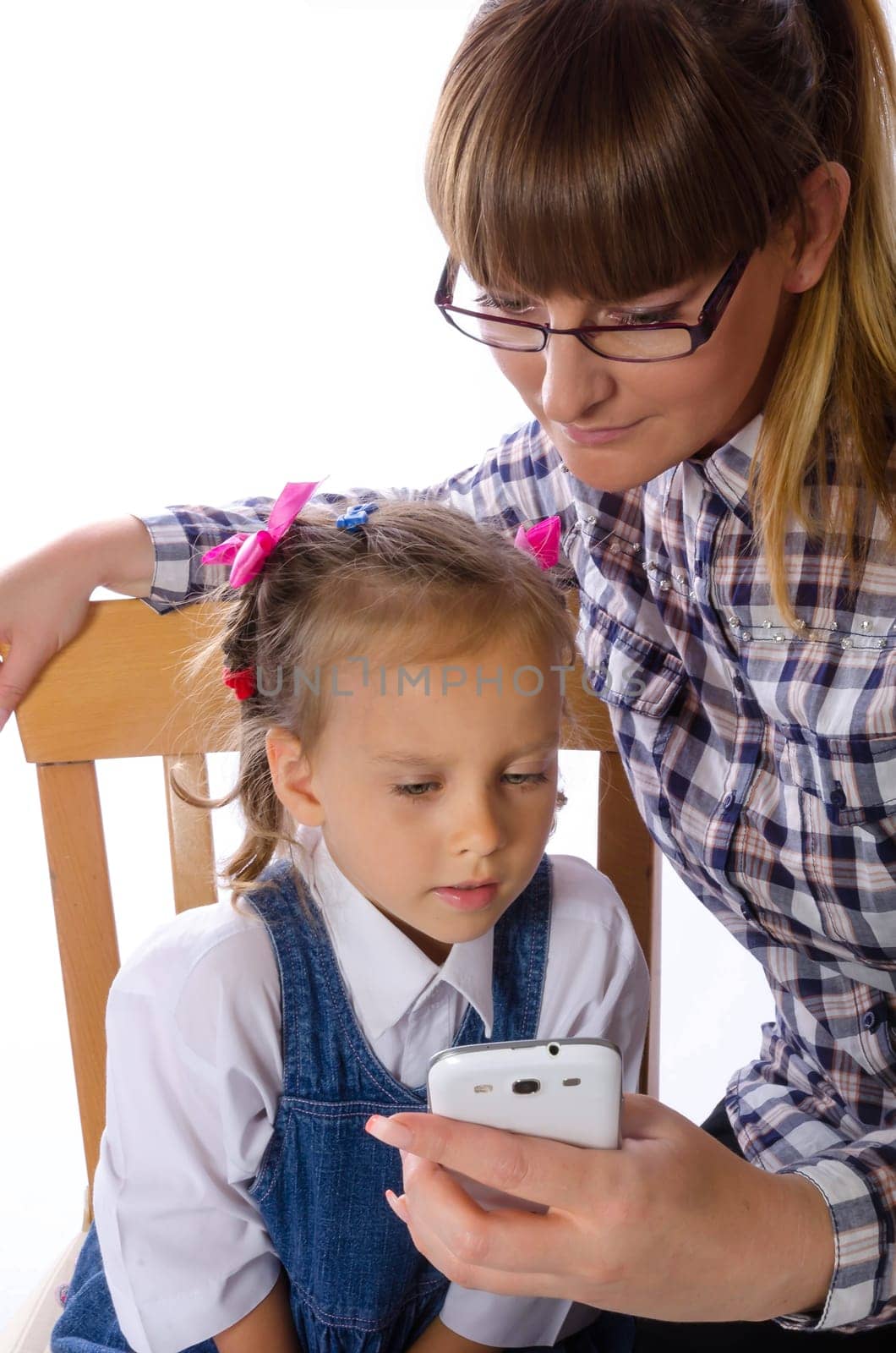 mother and daughter with mobile phone