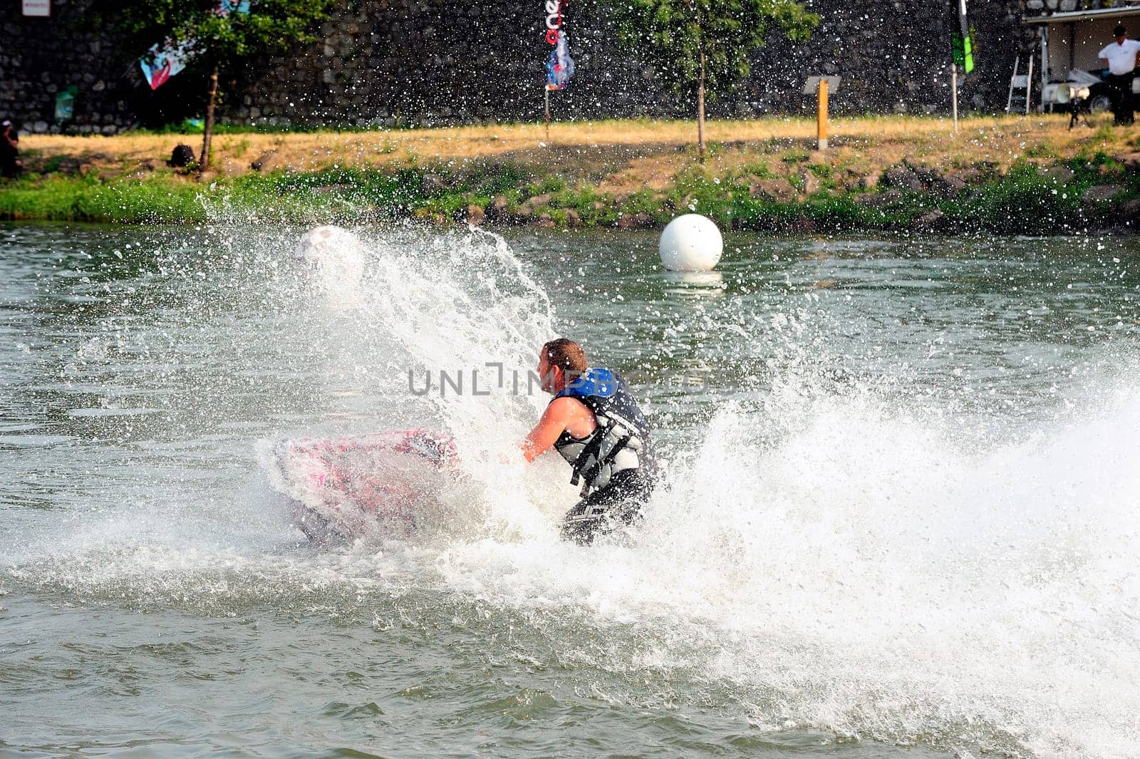 Ales - France - on July 14th, 2013 - Championship of France of Jet Ski on the river Gardon. lifting category or freestyle