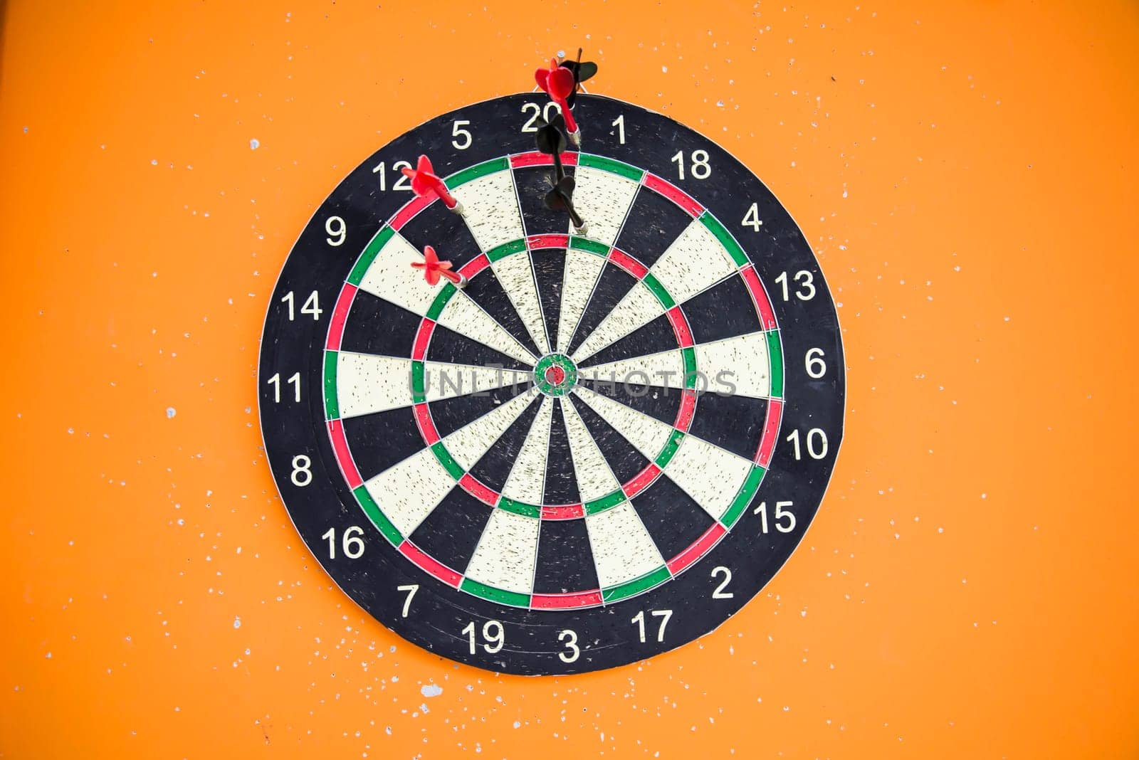 The darts on the wall in the gyms.