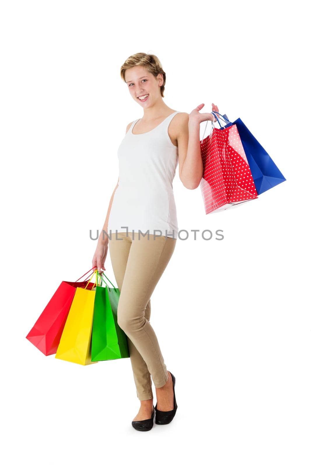 Happy woman with shopping bags on a white background