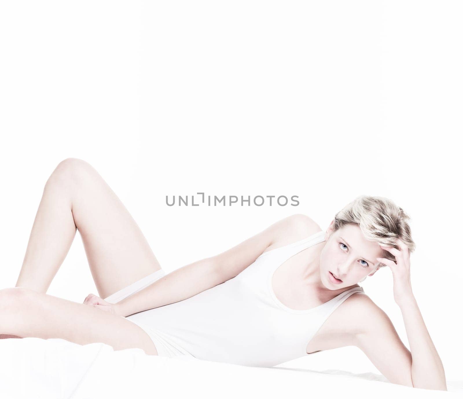 androgynous looking woman on white background