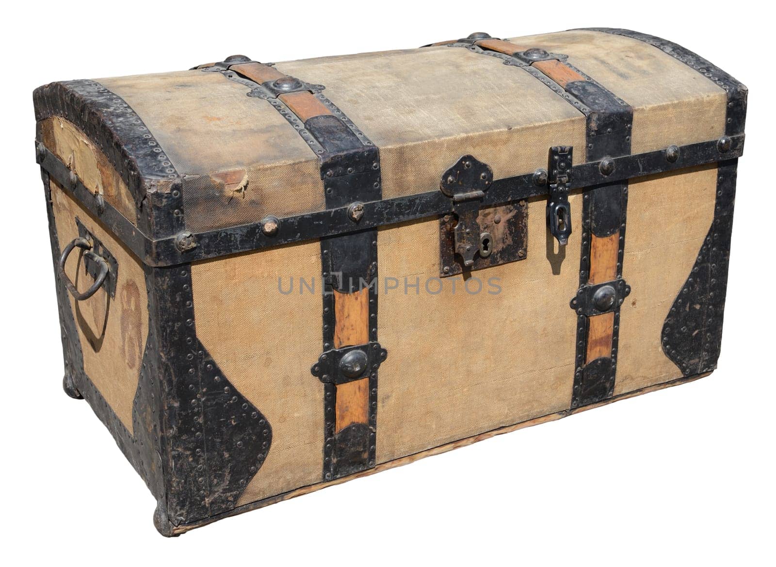 Old wooden trunk with metal elements isolated on white.