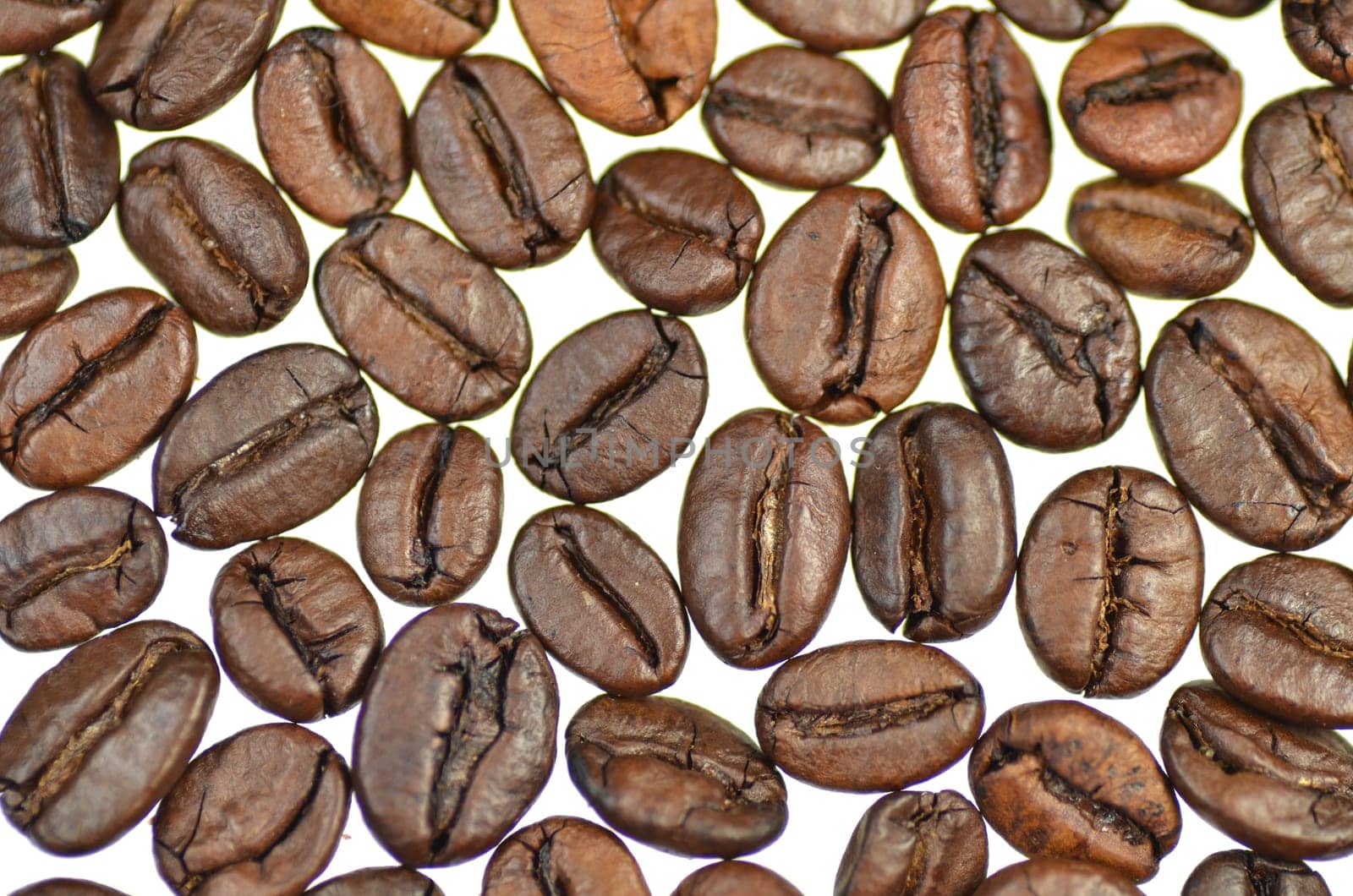 roasted coffee beans isolated on white background