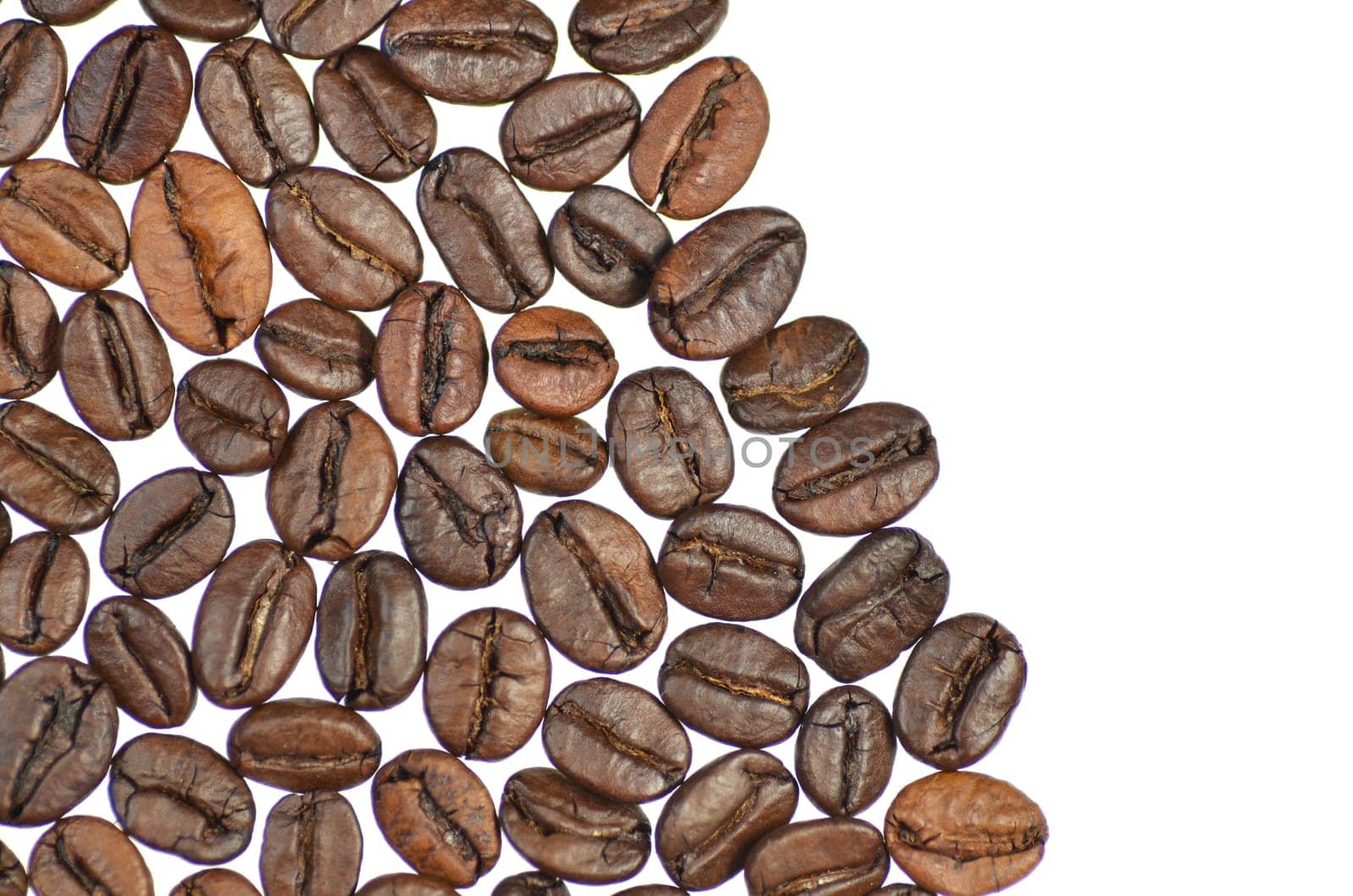 roasted coffee beans isolated on white background
