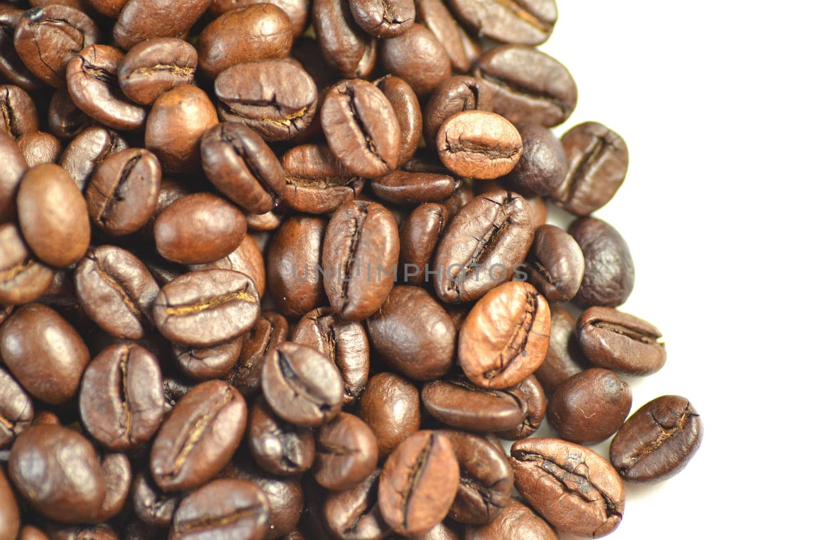 roasted coffee beans isolated on white background