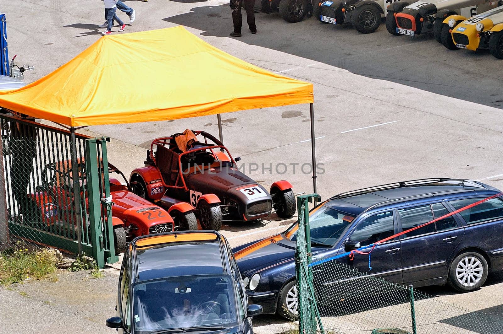 chases of Caterham on the circuit of the Cevennes with Ales in the French department of Gard the May 24th and 25th, 2013. The Caterham stands