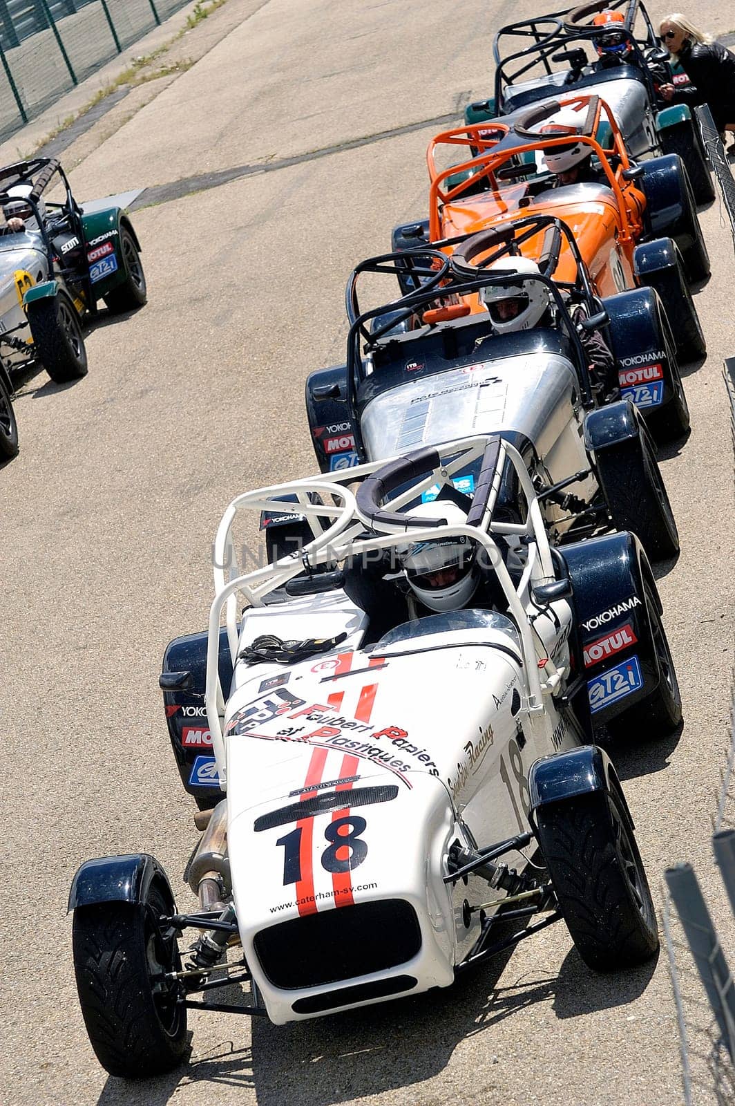 chases of Caterham on the circuit of the Cevennes with Ales in the French department of Gard the May 24th and 25th, 2013. on the starting line before the race