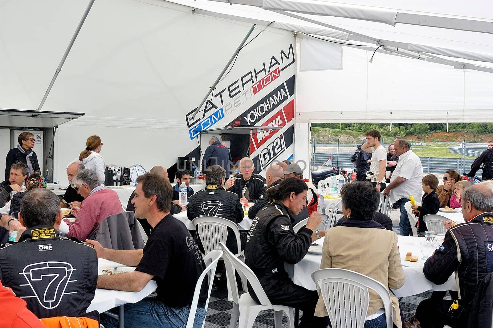 chases of Caterham on the circuit of the Cevennes with Ales in the French department of Gard the May 24th and 25th, 2013. the pause lunch
