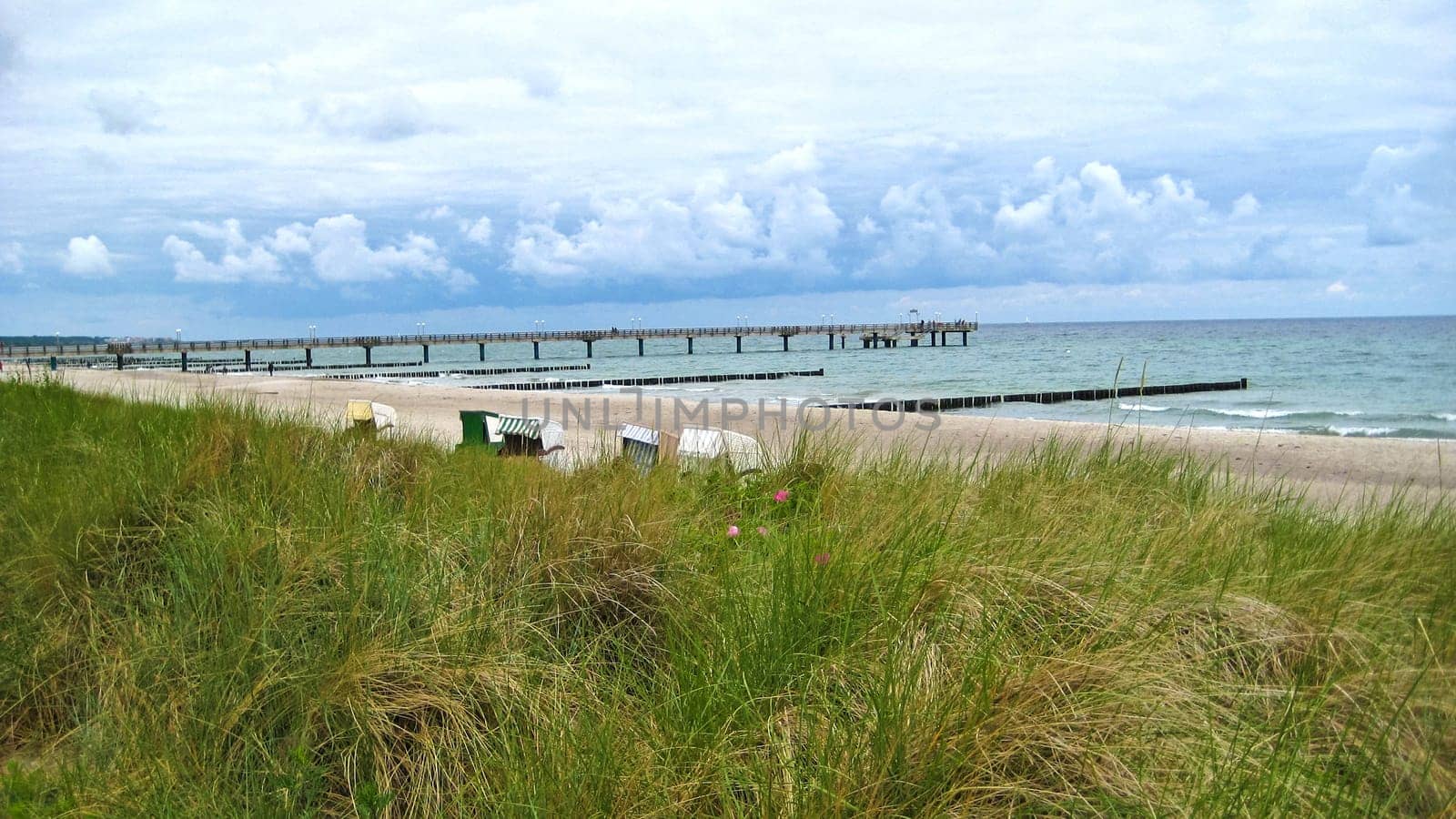 Behind the beach of Kühlungsborn, Baltic Sea, Germany with view towards the pier