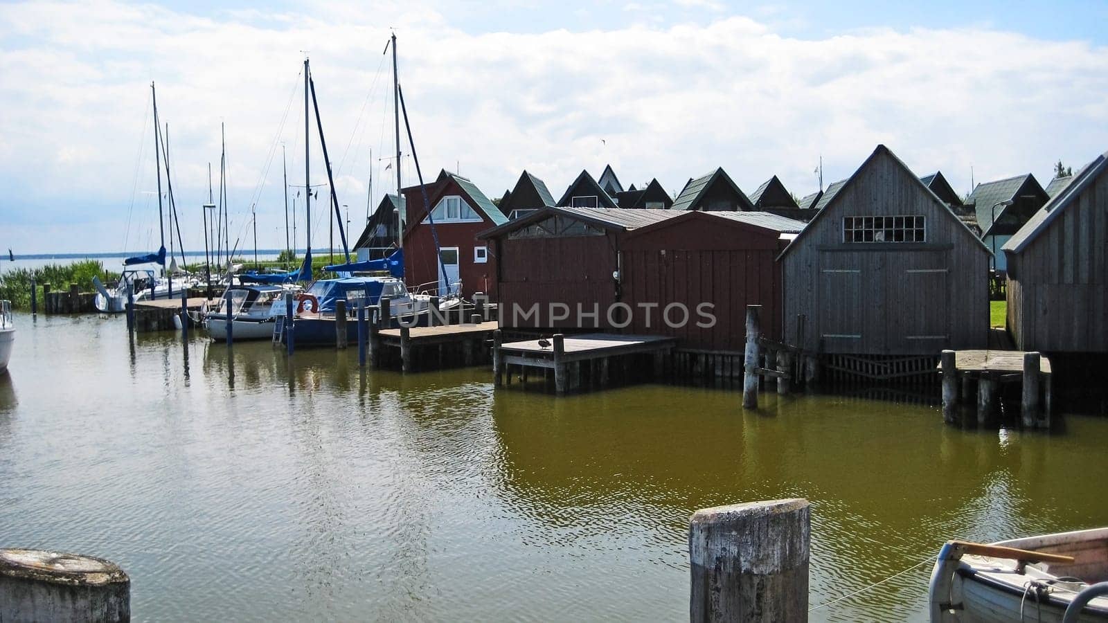 Boat houses at the harbor of Niehagen, Ahrenshoop, peninsula Fischland-Darss-Zingst
