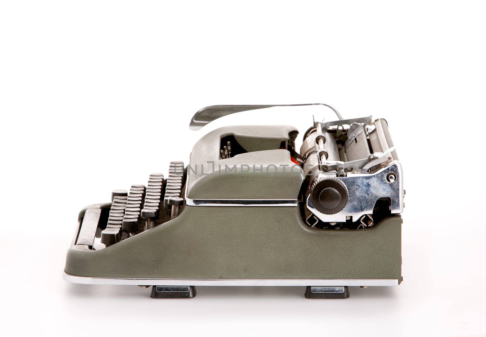 A military green old mechanical typewruter on a white backround