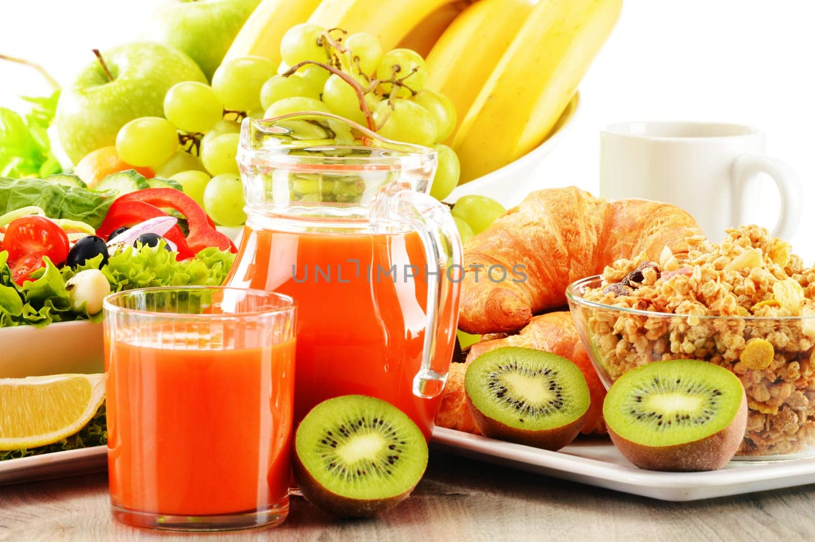 Breakfast with coffee, juice, croissant, salad, muesli and egg. Swedish buffet