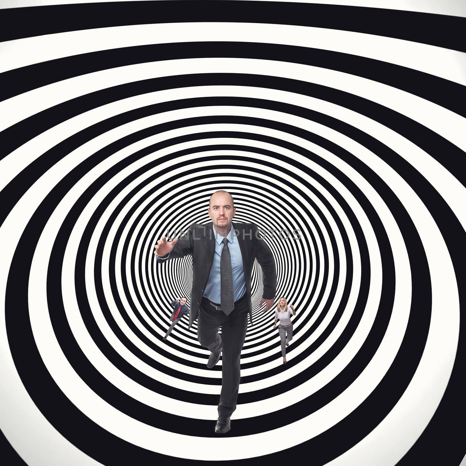 business people running in abstract tunnel