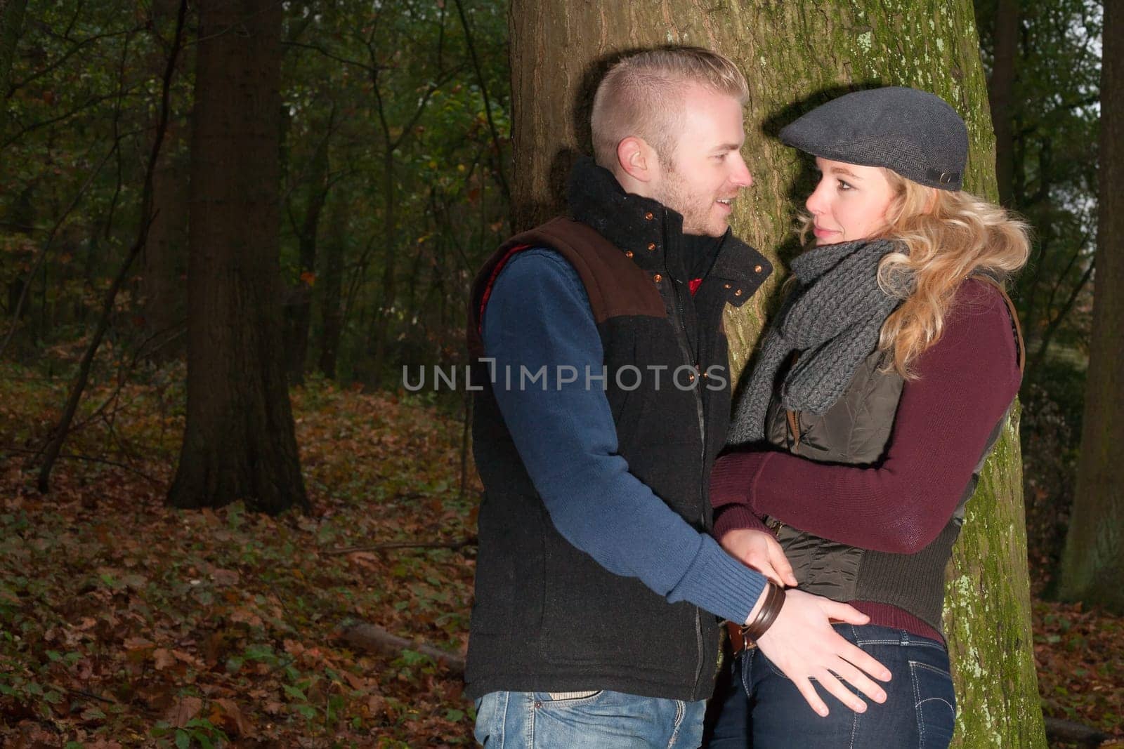 Happy young couple is having a nice time in october