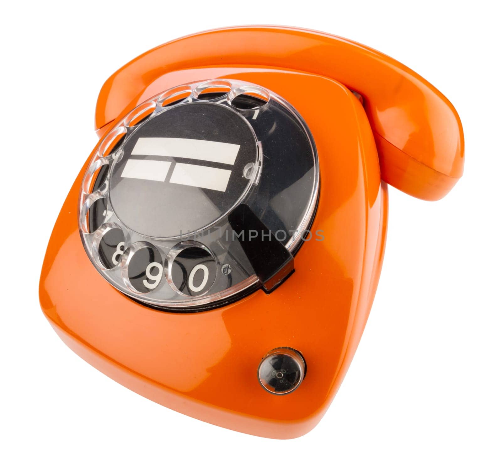 Old retro phone with dial in orange