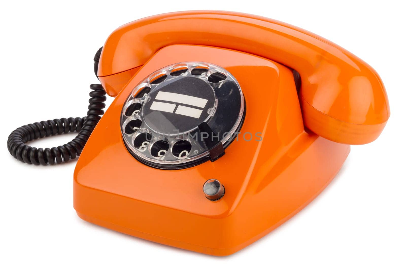 Old retro phone with dial in orange