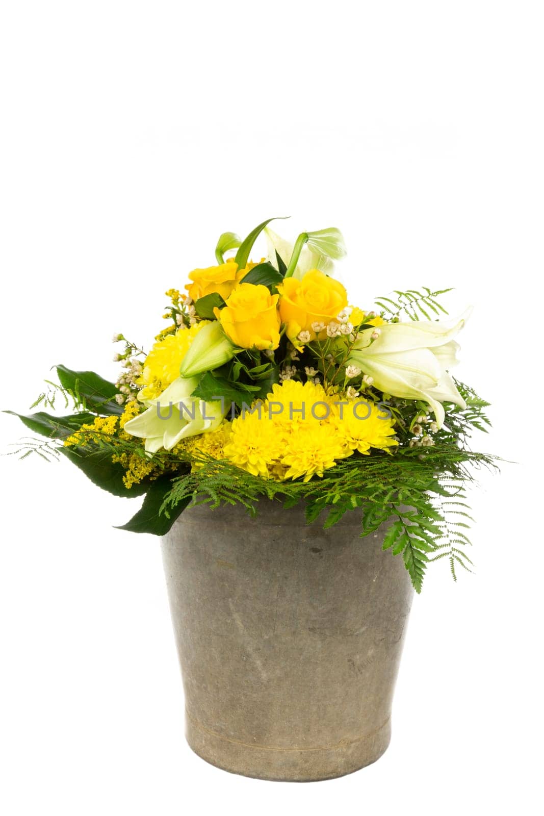 An old zinc germ with a bouquet of flowers