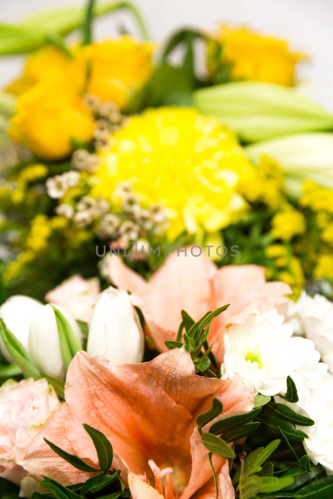 A bouquet of roses,lilies,amaryllis and chrysanthemums,focus front