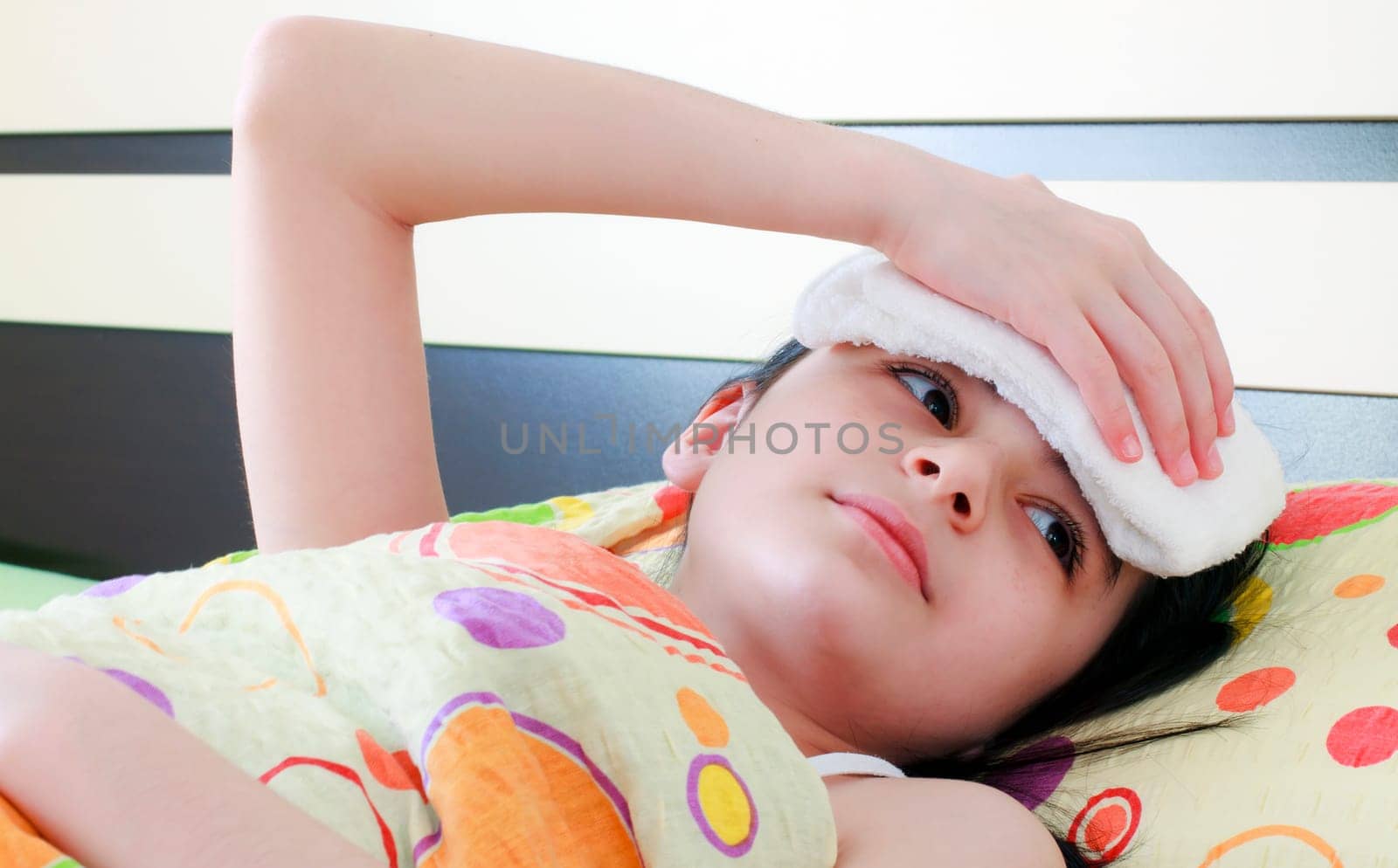 Sick girl in bed