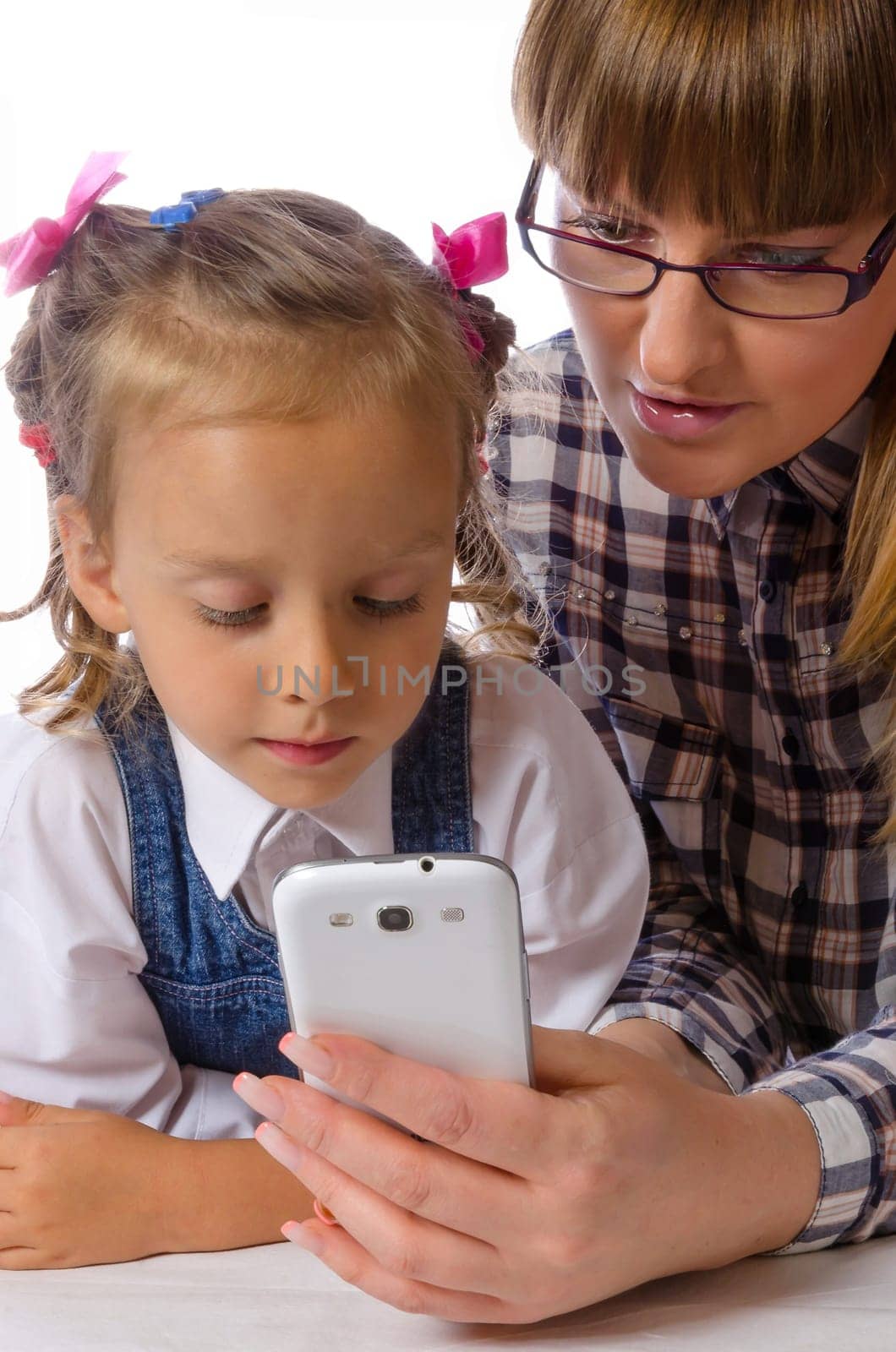 mother and daughter with mobile phone