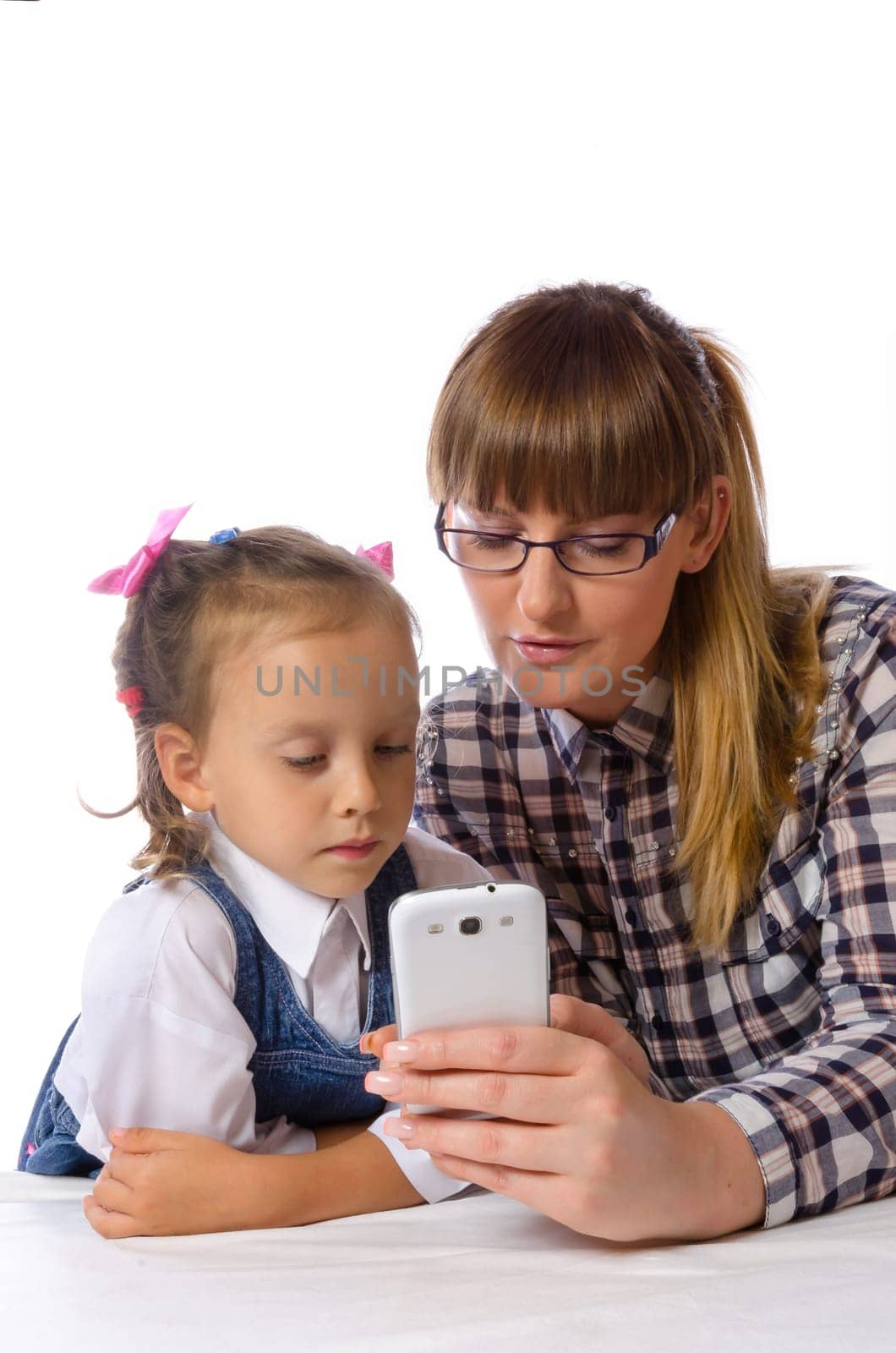 mother and daughter with mobile phone
