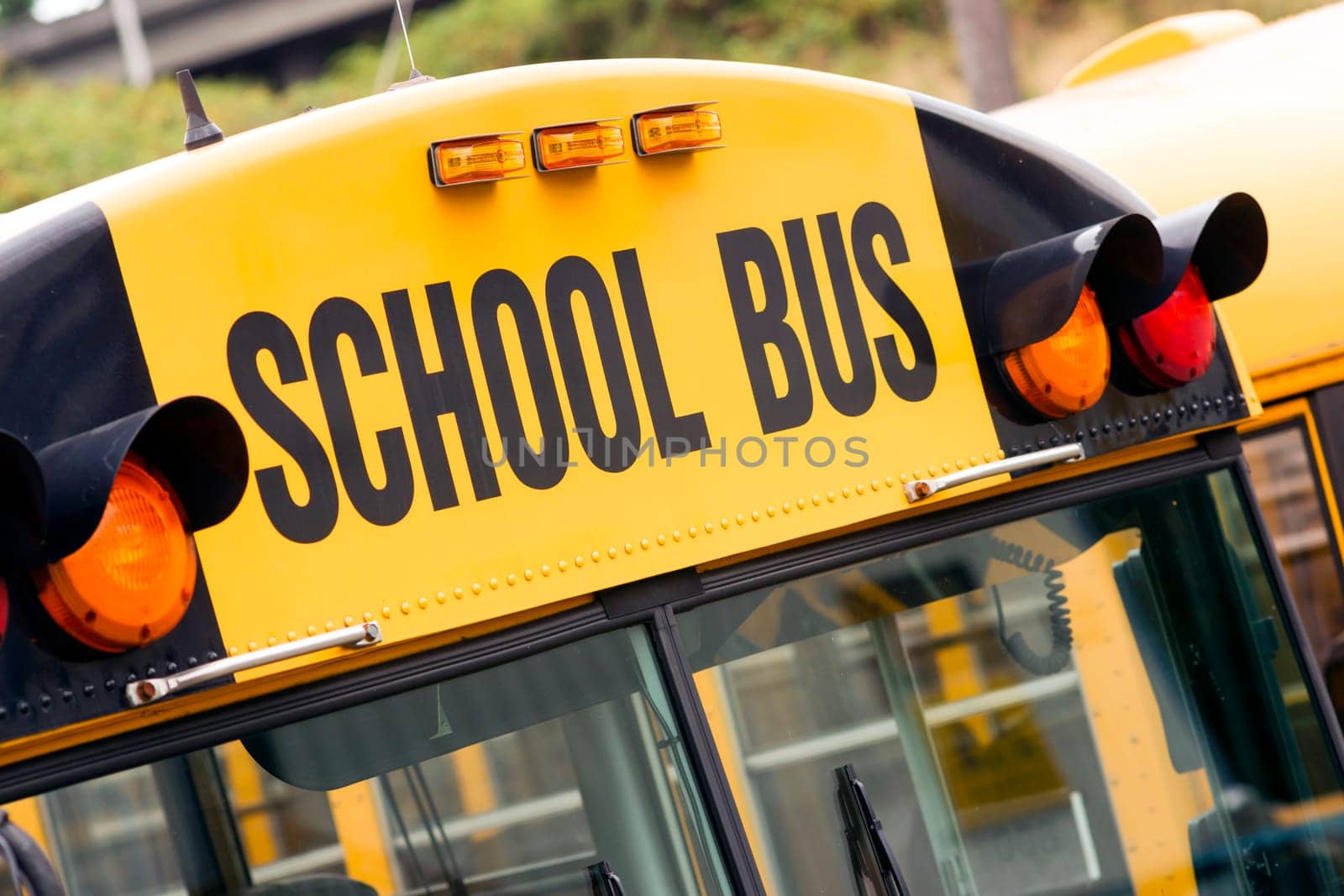 School bus sitting in the parking lot waiting to be in service