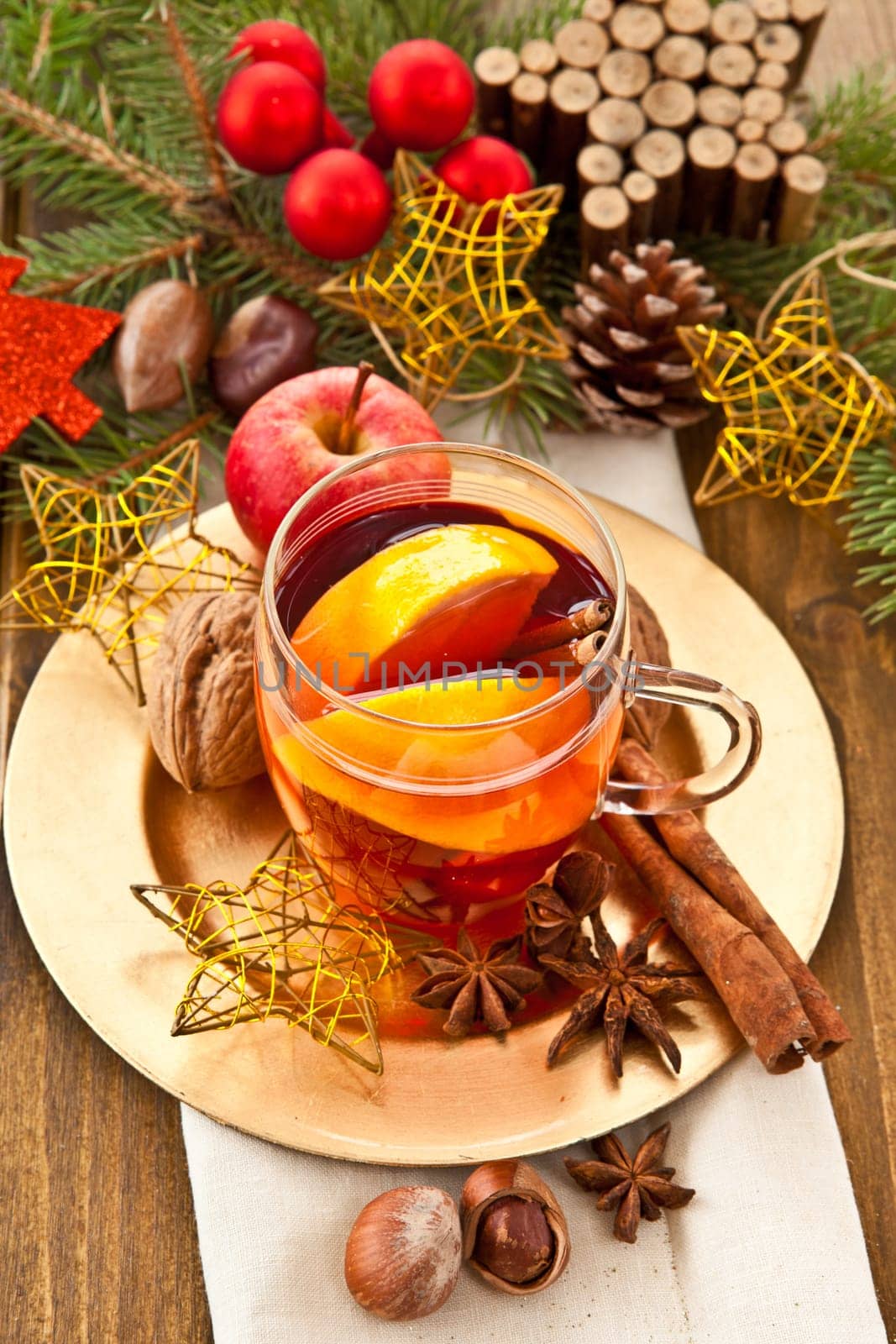 Hot drink for Christmas with cinnamon and oranges