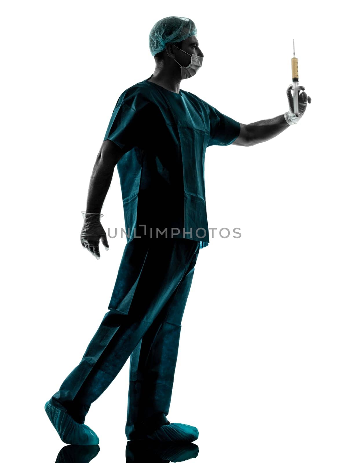 one caucasian doctor surgeon Anesthetist man holding surgery needle silhouette isolated on white background