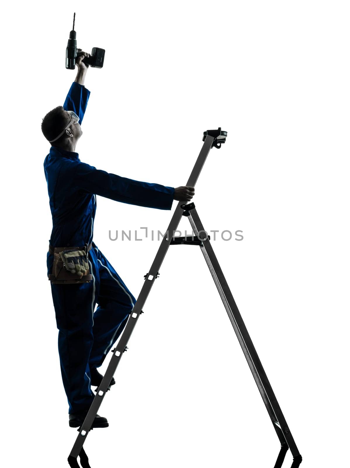 one caucasian man construction worker holding drill silhouette in studio on white background