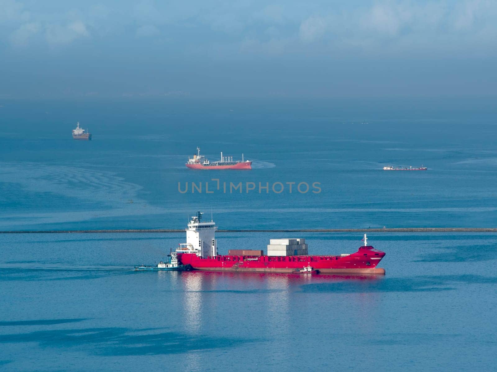 big red container ship