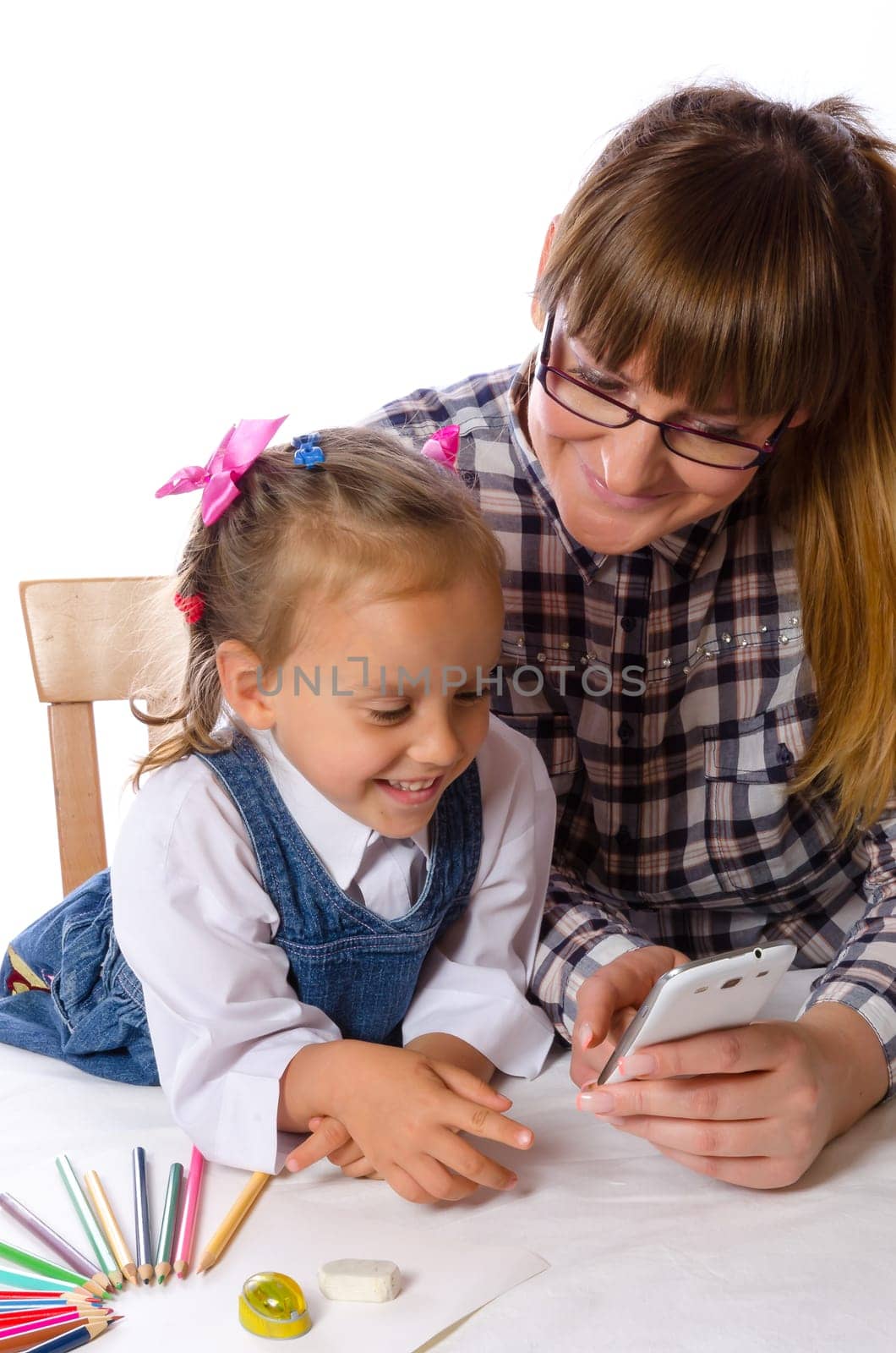 mother and daughter with mobile phone