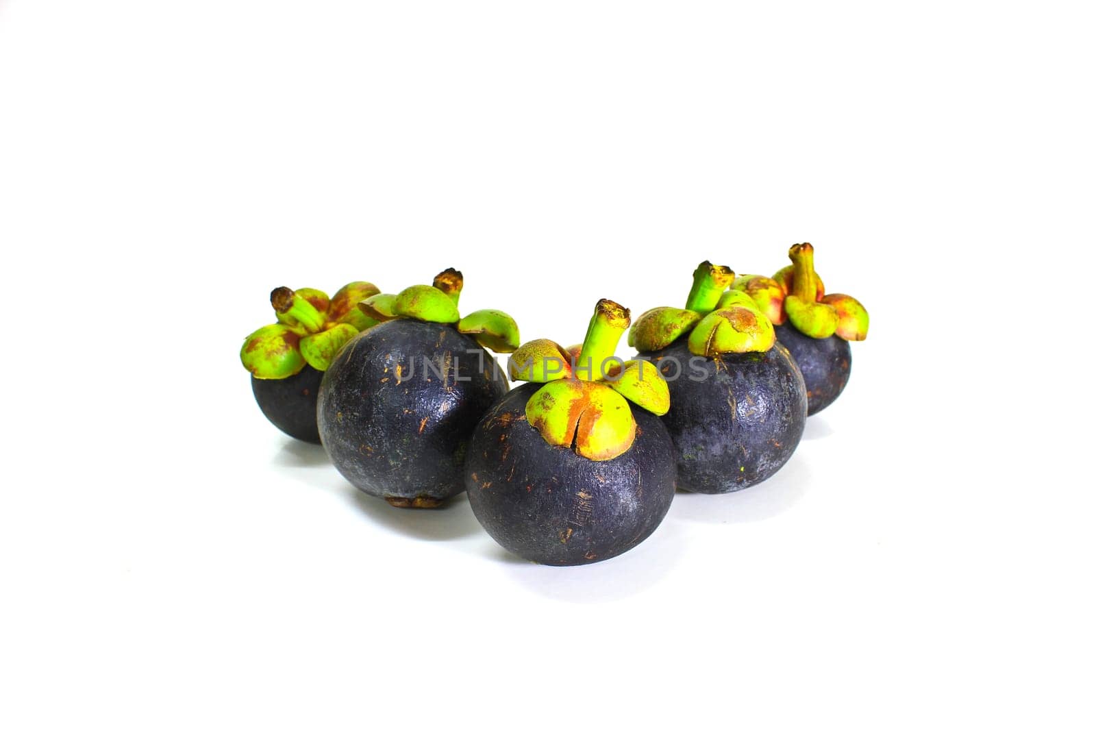 tropical mangosteen fruit on white background