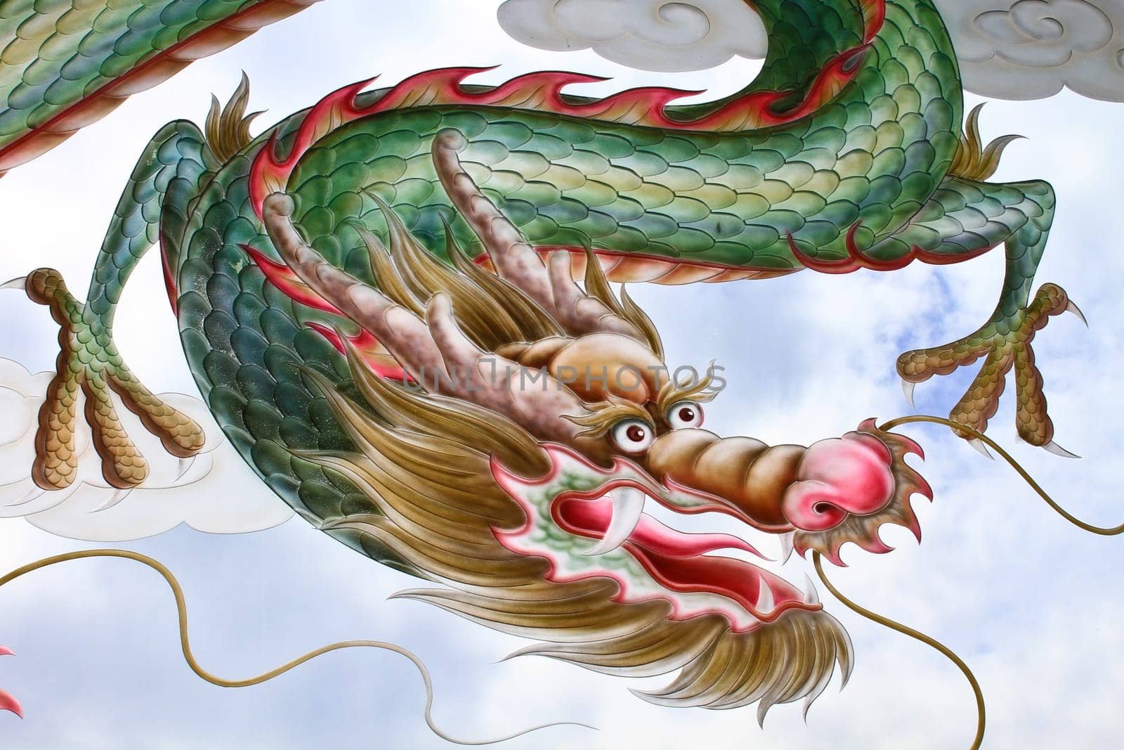 Dragon painting on the glass Of Chinese Temple In Thailand