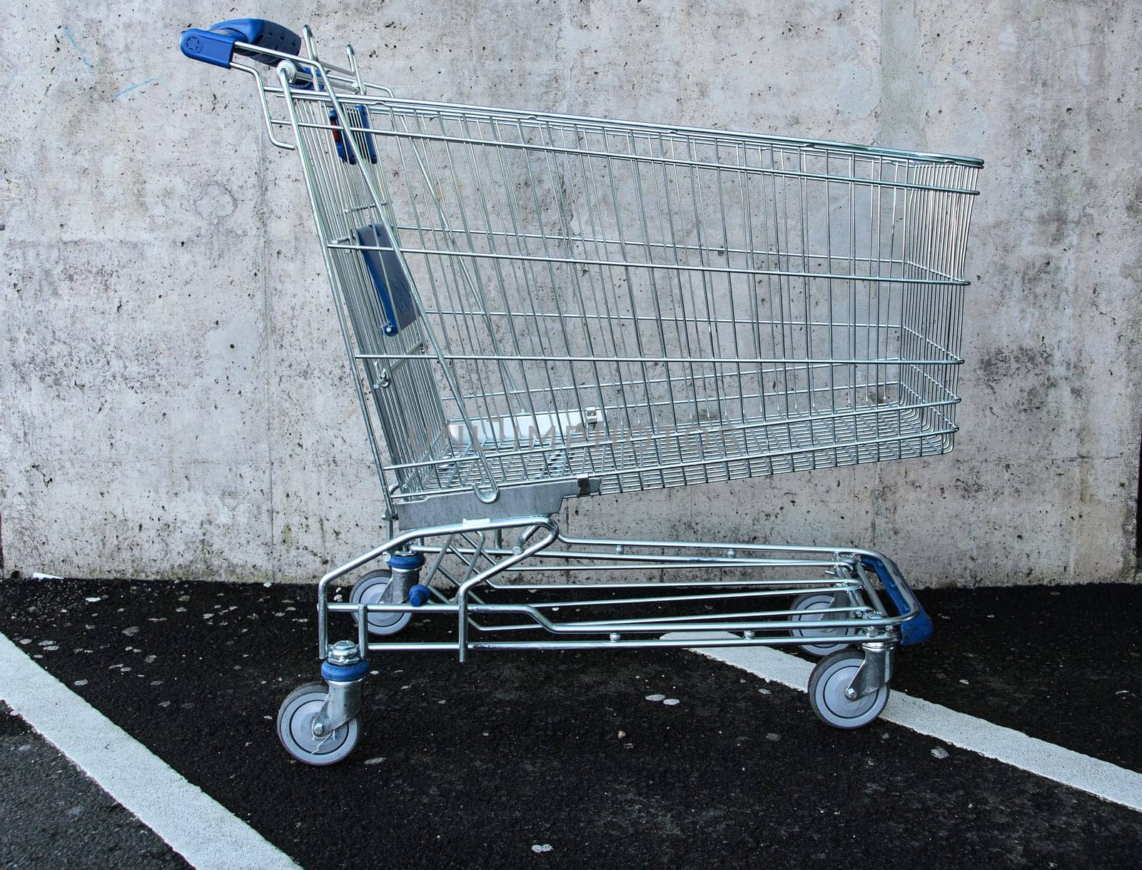 a shopping cart belonging to the store but ended up in the parking lot