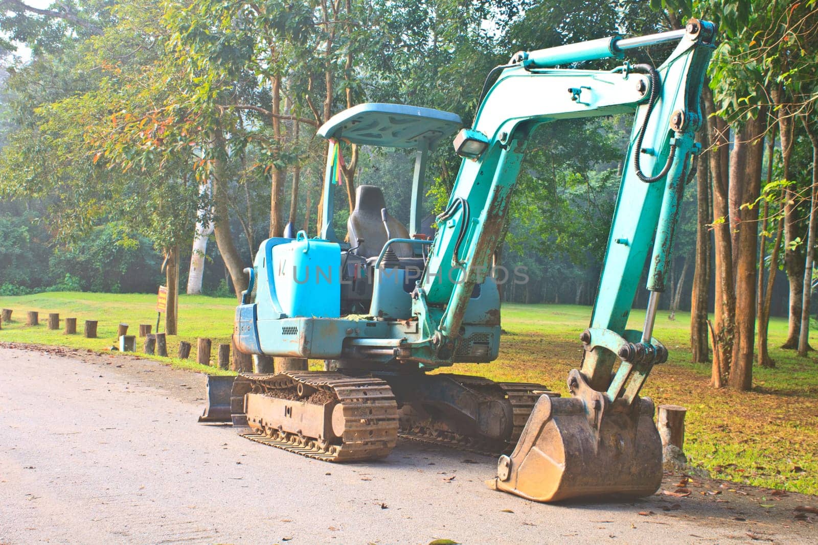 Back Hoe construction machinery equipment standing in construction site