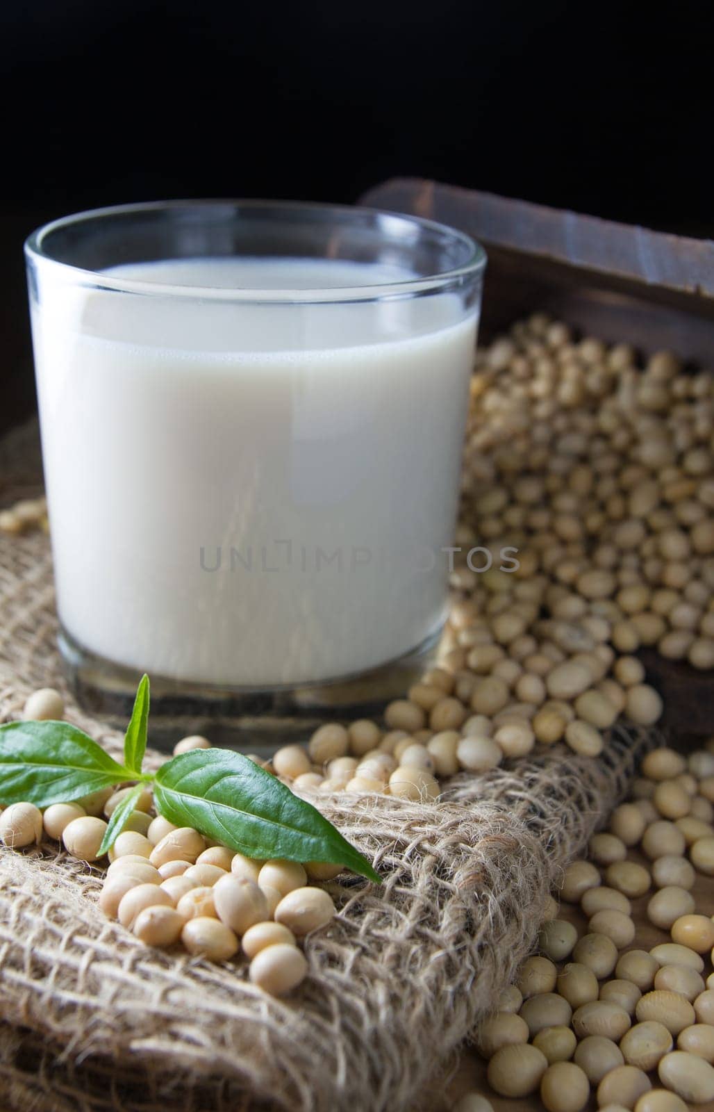 soy milk with soy beans background