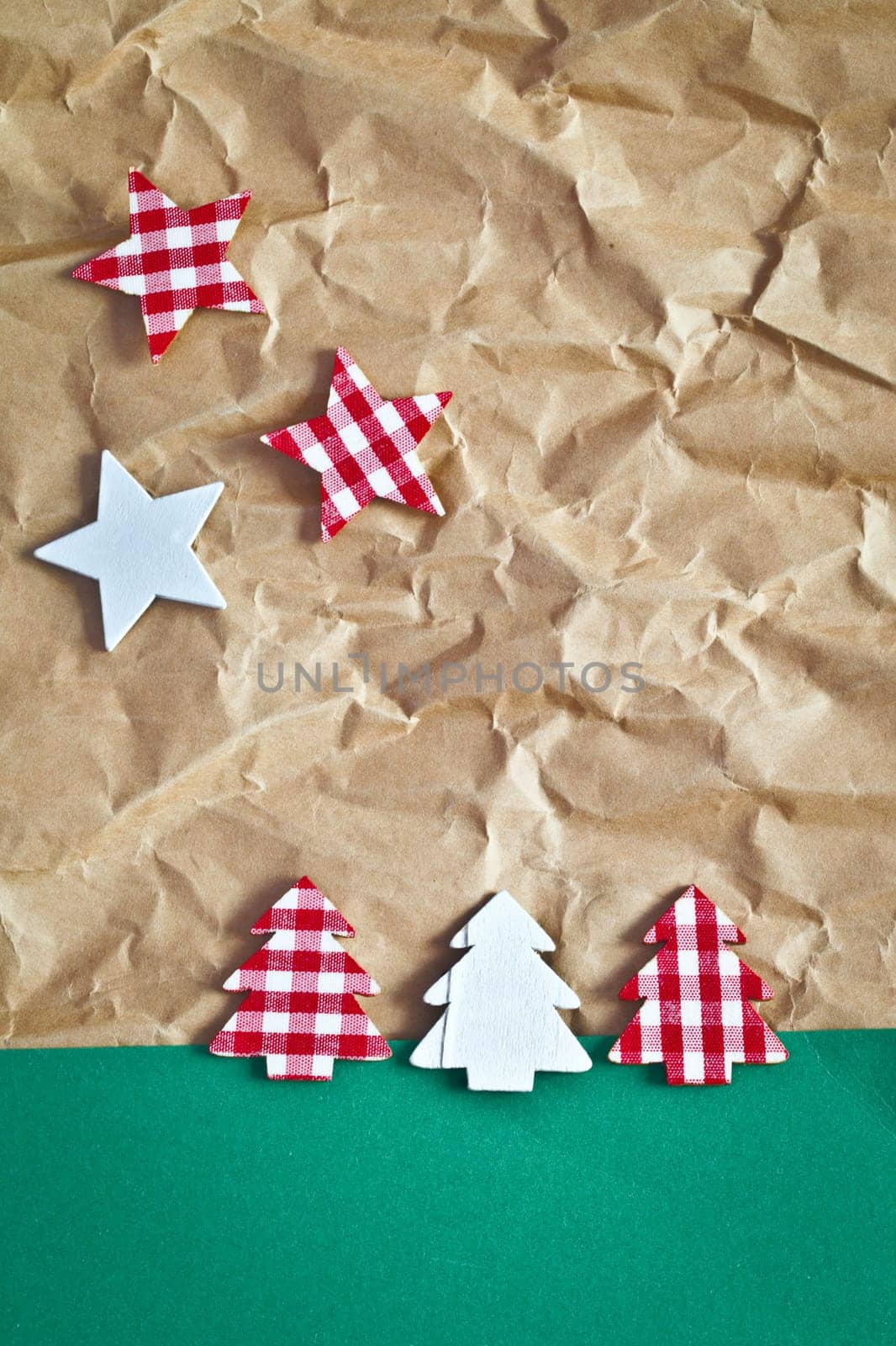Small colorful fir trees and stars on paper