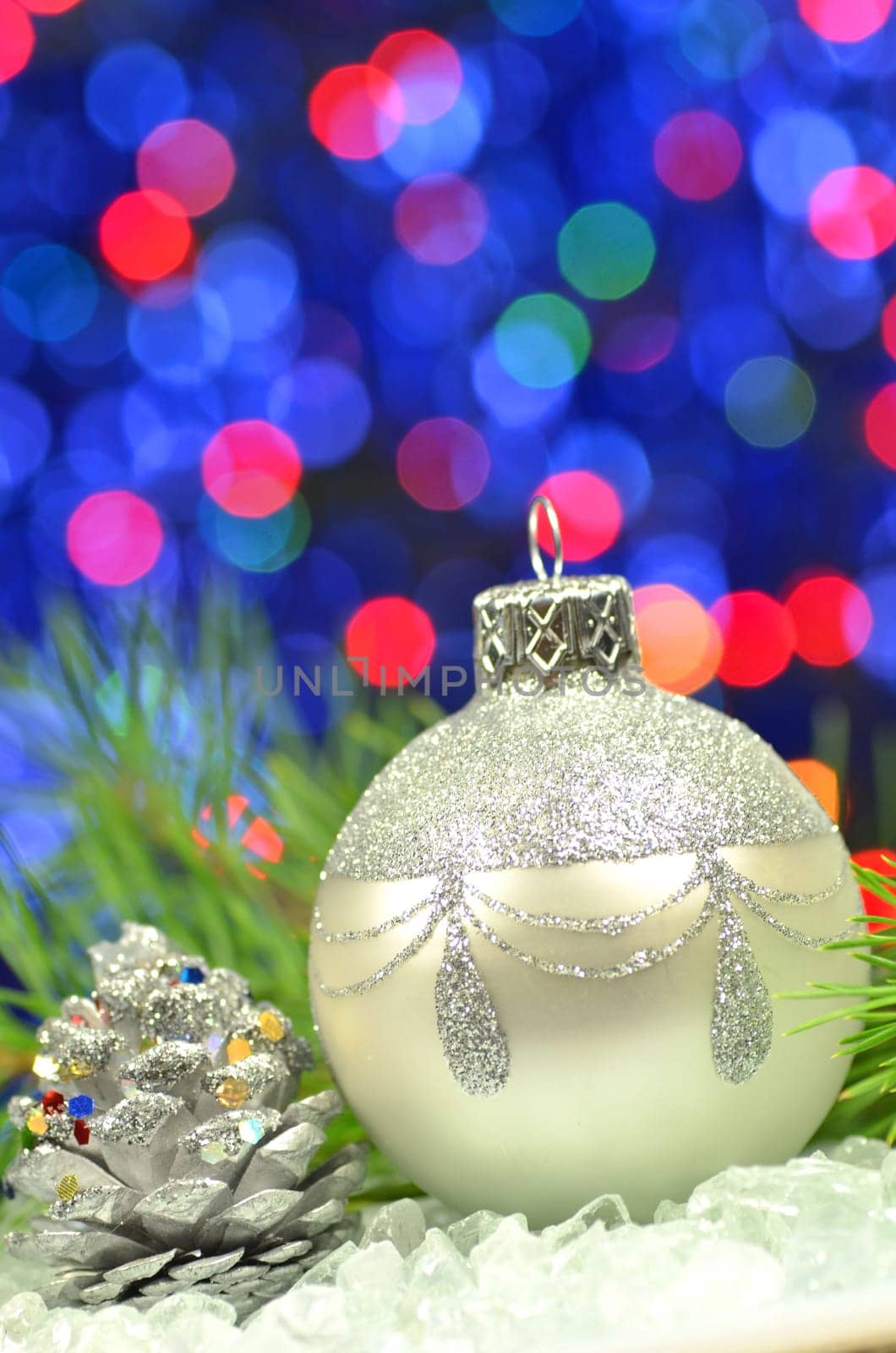 christmas decoration, silver Christmas ball against bokeh background