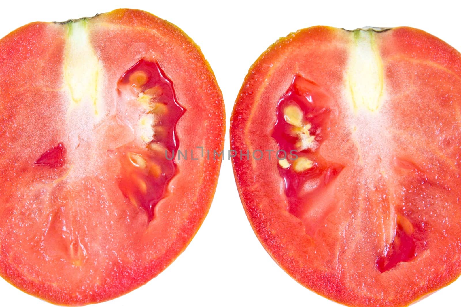 cut of juicy tomato on a white background