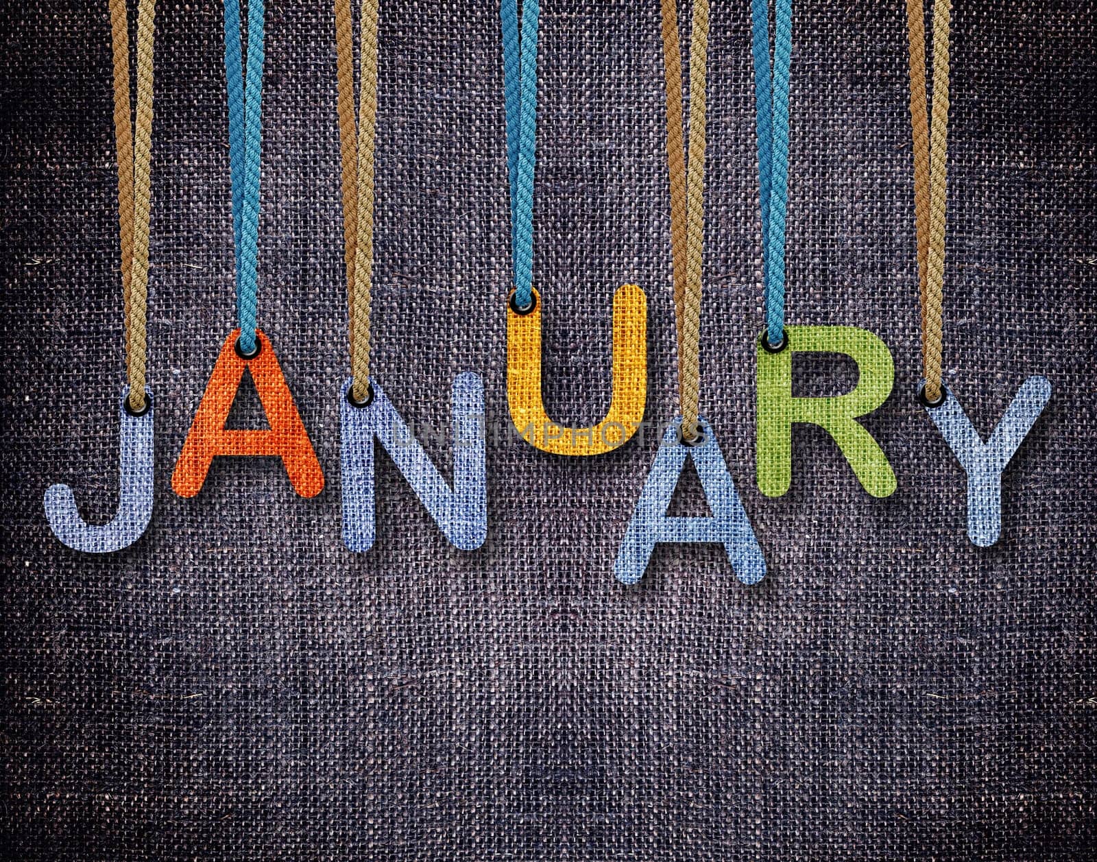 January letters hanging strings with blue sackcloth background.