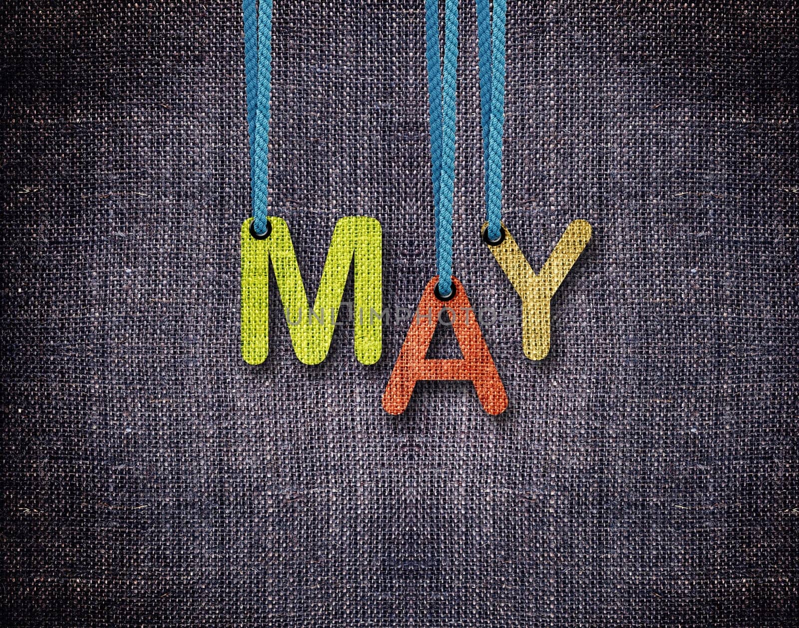 May letters hanging strings with blue sackcloth background.