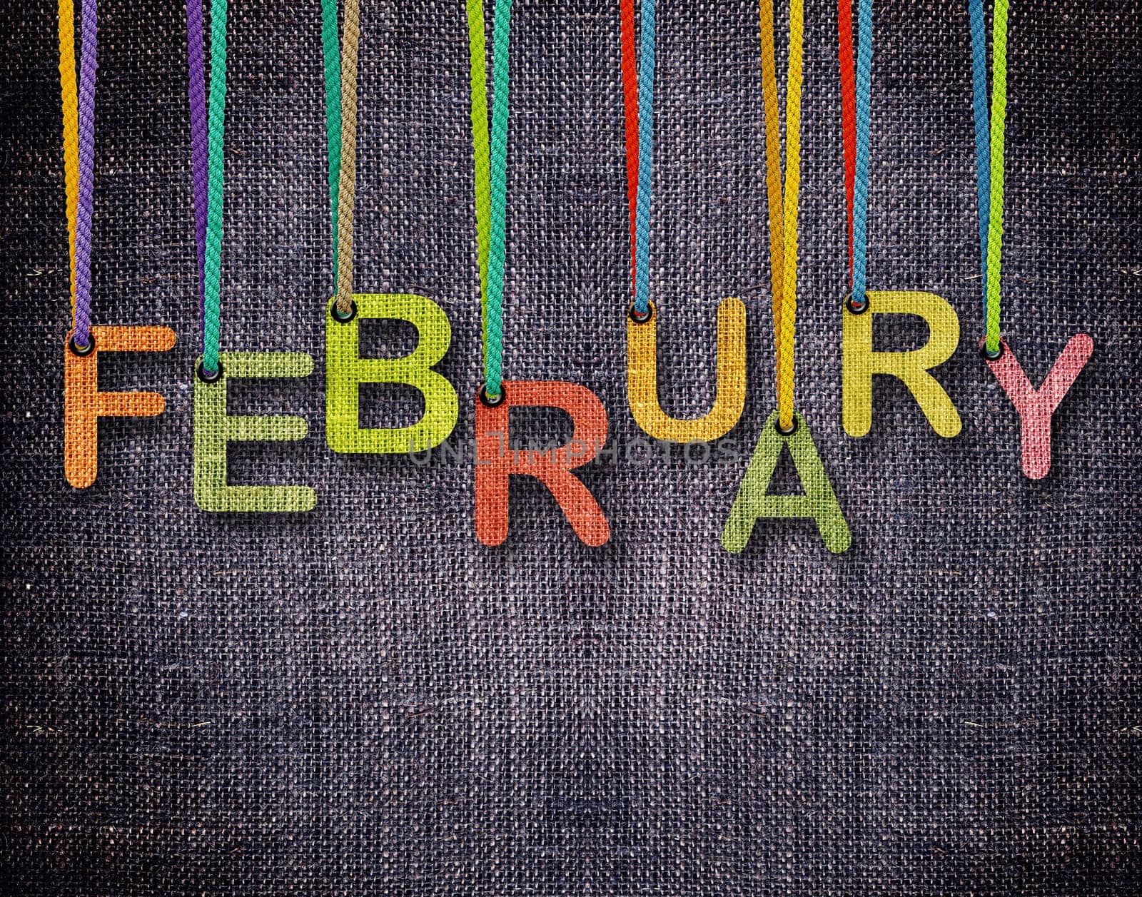 February letters hanging strings with blue sackcloth background.
