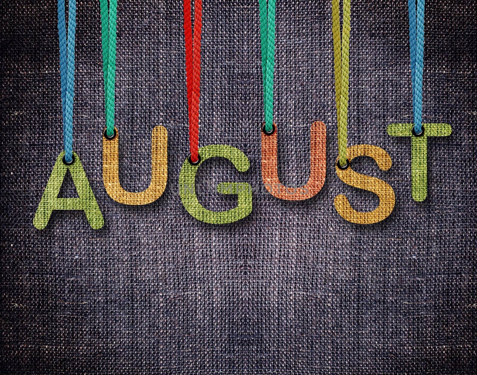 August letters hanging strings with blue sackcloth background.