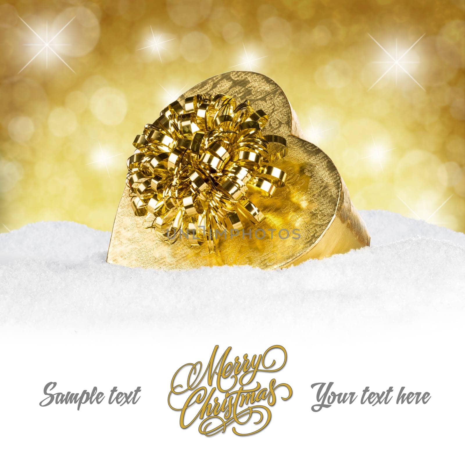 Golden gift on snow in front of a golden background