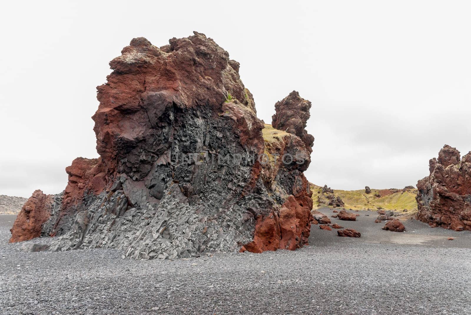 multicolored rock on the beaches of Langaholt in Iceland