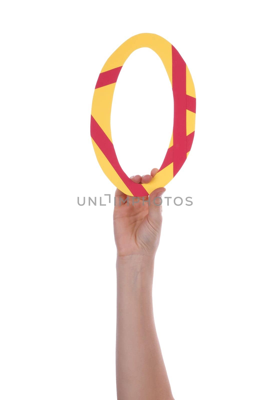 A Hand Holding a Colorful Zero, Isolated