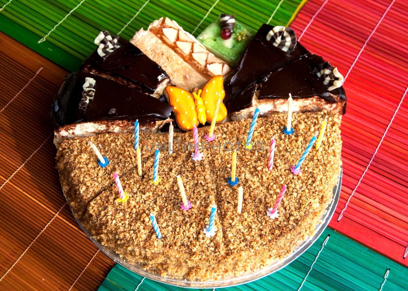 Various pieces of cake with candles for celebration