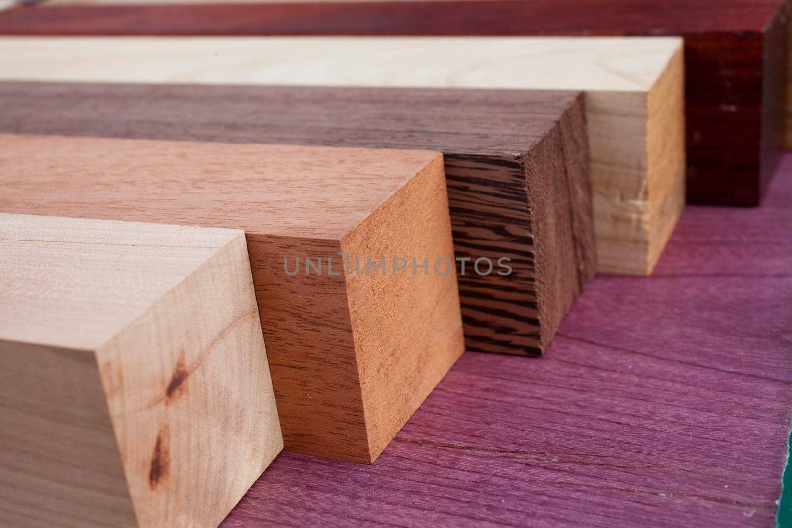 Precious wood squares made of different woods / types of wood